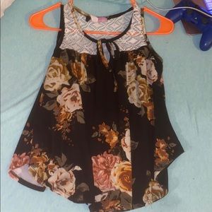 A black floral tank top with a Lacey top